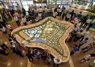 Visitors to HDB looking at the new Tengah masterplan / model....Photo. Ernerst chua.